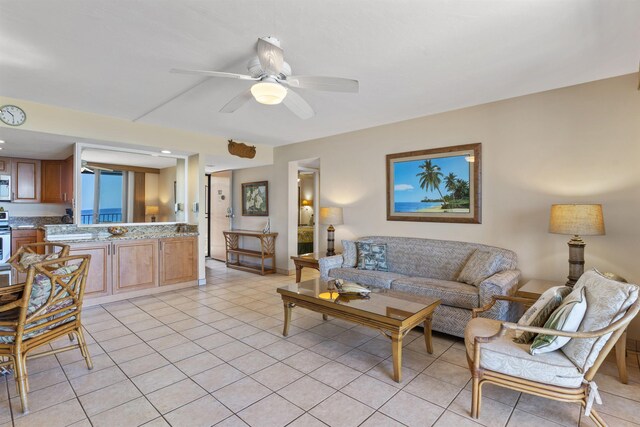 3723 Lower Honoapiilani Rd Unit 302, Lahaina, HI 96761 - living room with light tile patterned floors and a ceiling fan