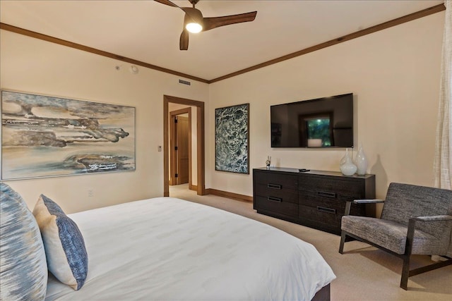 bedroom with ceiling fan, crown molding, and light carpet