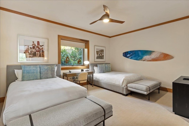 bedroom with ceiling fan and crown molding