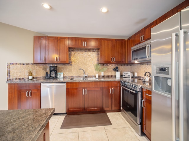 130 Kai Malina Pkwy Unit 719, Lahaina, HI 96761 - kitchen with appliances with stainless steel finishes, a sink, backsplash, light tile patterned floors, and recessed lighting