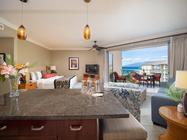 130 Kai Malina Pkwy Unit 719, Lahaina, HI 96761 - kitchen featuring open floor plan, ceiling fan, hanging light fixtures, crown molding, and carpet
