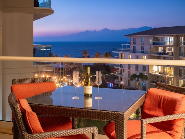 130 Kai Malina Pkwy Unit 719, Lahaina, HI 96761 - balcony at dusk with a water view