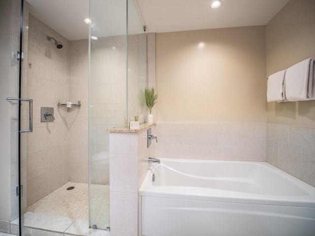 130 Kai Malina Pkwy Unit 719, Lahaina, HI 96761 - bathroom featuring a garden tub, a stall shower, and recessed lighting