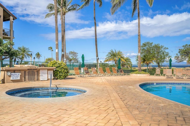 view of pool featuring a patio