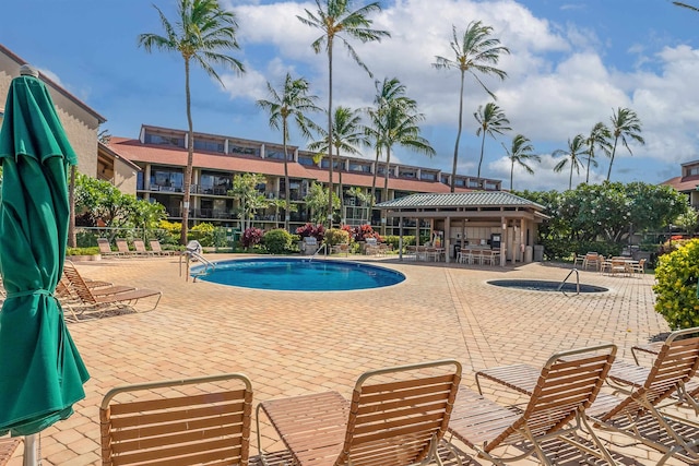 view of swimming pool featuring a patio