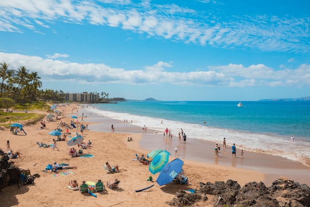 view of water feature with a beach view