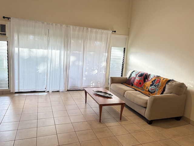 living area featuring light tile patterned floors