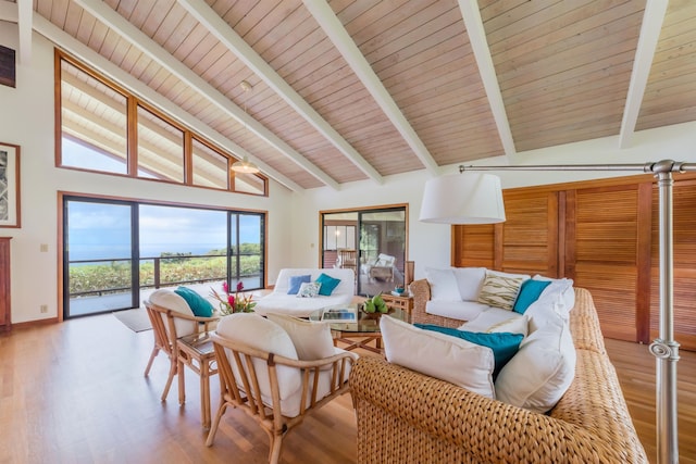 living room with wood ceiling, beam ceiling, high vaulted ceiling, and hardwood / wood-style flooring