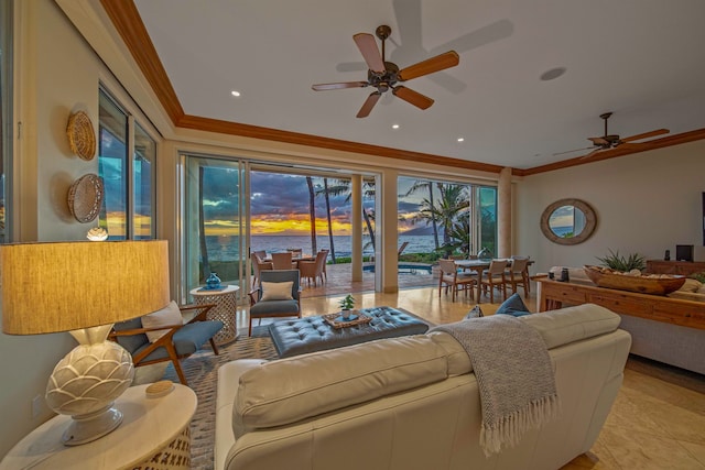 living room featuring light tile patterned flooring, a water view, crown molding, and ceiling fan