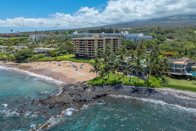 aerial view featuring a view of the beach and a water view