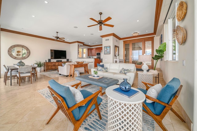 tiled living room with ornamental molding and ceiling fan