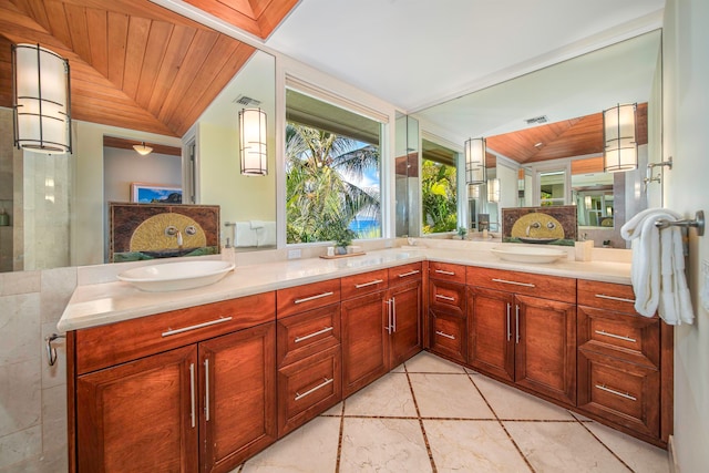 bathroom with tile patterned flooring, dual vanity, and wooden ceiling