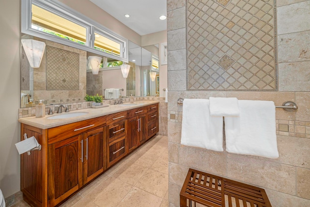 bathroom with decorative backsplash, tile walls, and tile patterned floors