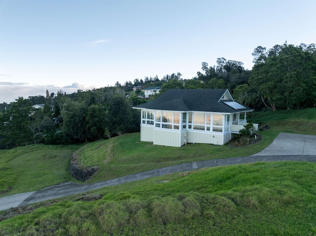 210 Napoko Pl, Kula, HI 96790 - view of front of property featuring a sunroom and a front yard
