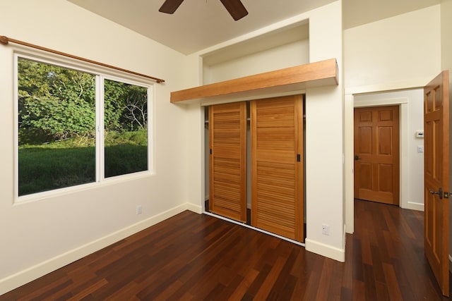 210 Napoko Pl, Kula, HI 96790 - unfurnished bedroom featuring baseboards, dark wood finished floors, and a closet