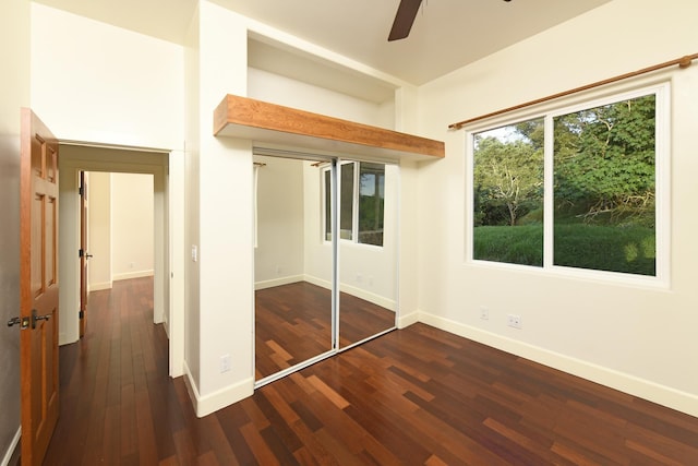 210 Napoko Pl, Kula, HI 96790 - unfurnished bedroom featuring dark wood-type flooring, baseboards, and a ceiling fan