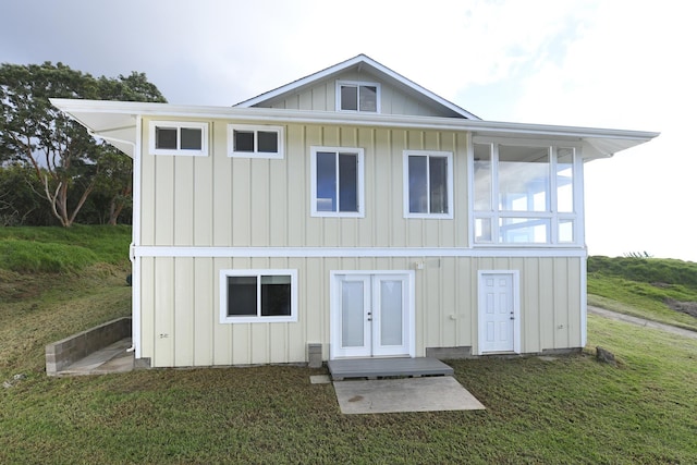 210 Napoko Pl, Kula, HI 96790 - back of property with board and batten siding, a yard, and french doors