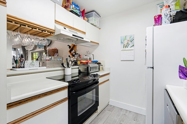 kitchen featuring premium range hood, white cabinetry, black electric range, light wood-type flooring, and white refrigerator