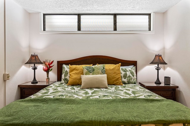 bedroom featuring a textured ceiling