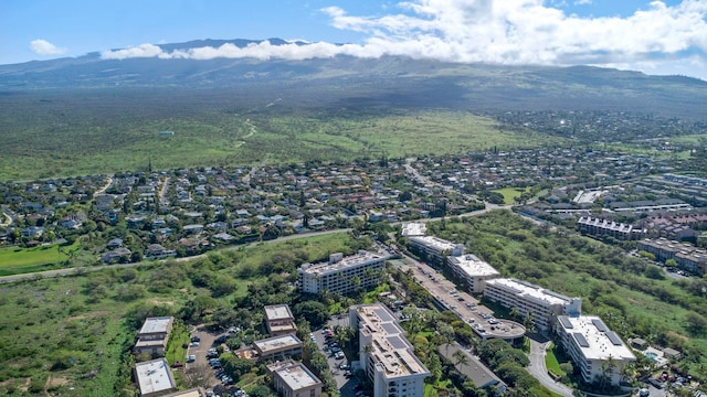 birds eye view of property with a mountain view