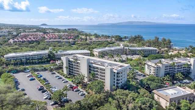 bird's eye view featuring a water and mountain view