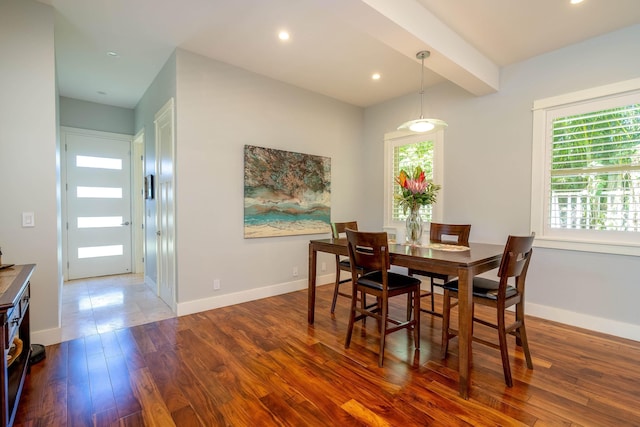 dining space featuring beamed ceiling, recessed lighting, baseboards, and wood finished floors