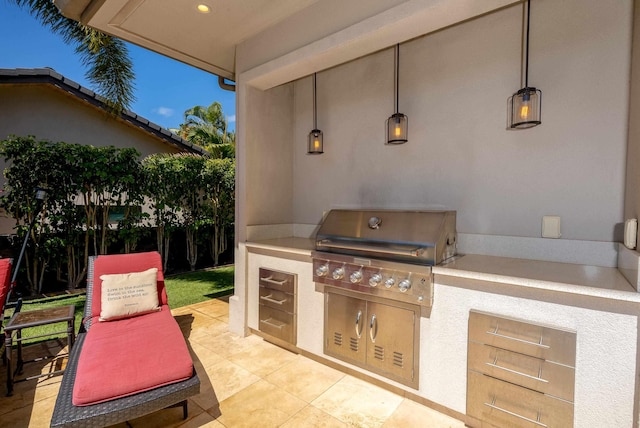 view of patio with area for grilling and grilling area