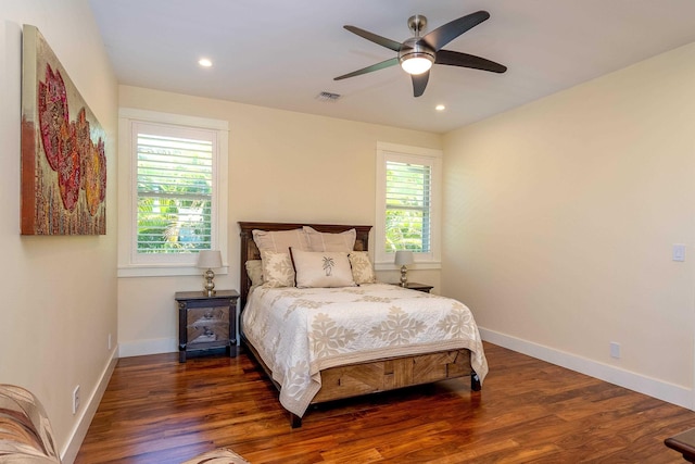 bedroom featuring visible vents, recessed lighting, wood finished floors, and baseboards