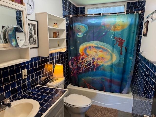 full bathroom featuring shower / bath combo, toilet, tile walls, and vanity