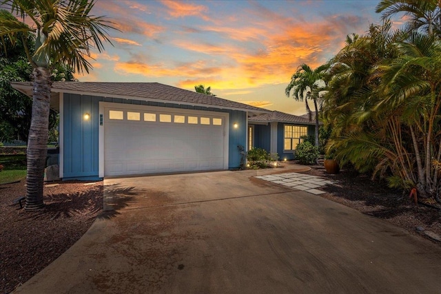 237 Kuli Puu St, Kihei, HI 96753 - view of front of property featuring a garage, board and batten siding, and driveway