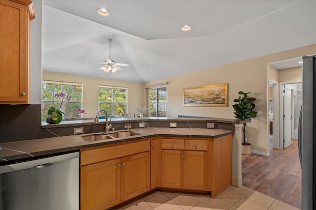 237 Kuli Puu St, Kihei, HI 96753 - kitchen with a sink, appliances with stainless steel finishes, dark countertops, ceiling fan, and lofted ceiling
