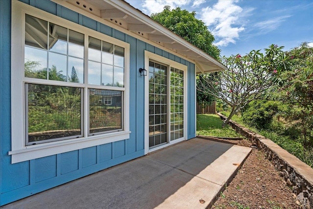 237 Kuli Puu St, Kihei, HI 96753 - doorway to property featuring board and batten siding and a patio area