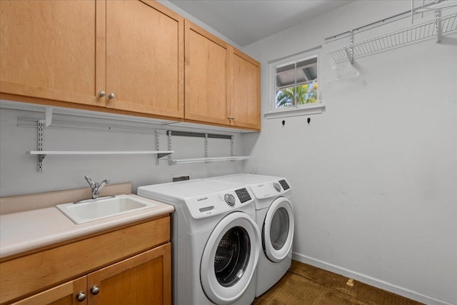 237 Kuli Puu St, Kihei, HI 96753 - laundry room with cabinet space, baseboards, and separate washer and dryer