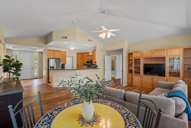 237 Kuli Puu St, Kihei, HI 96753 - living room featuring wood finished floors, ceiling fan, high vaulted ceiling, and baseboards