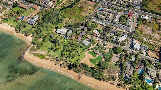 drone / aerial view featuring a residential view and a water view