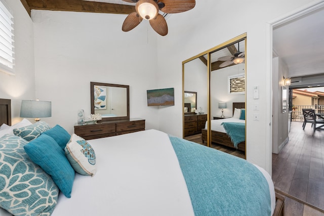 bedroom featuring hardwood / wood-style flooring, a closet, and ceiling fan