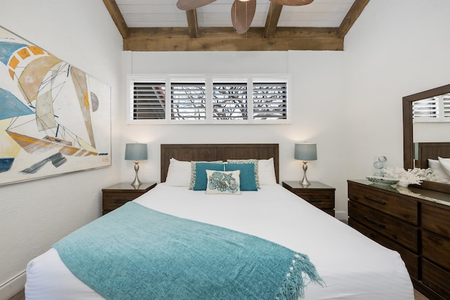 bedroom with beam ceiling