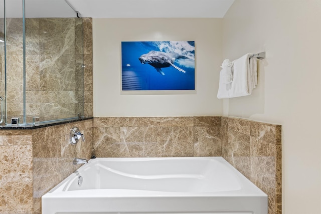 bathroom featuring a garden tub