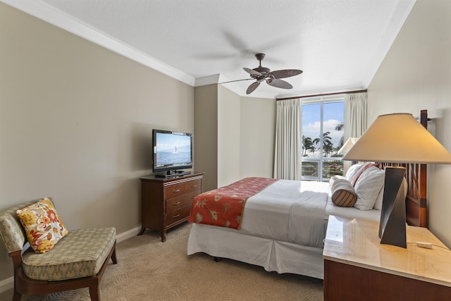 bedroom featuring a ceiling fan, light carpet, crown molding, and baseboards