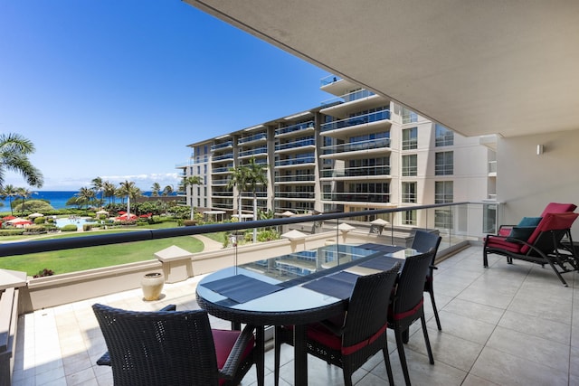 balcony featuring a water view