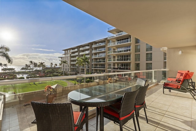 balcony with outdoor dining area