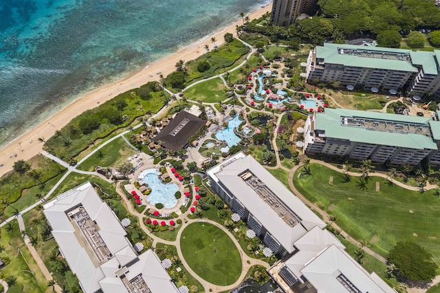 drone / aerial view featuring a beach view