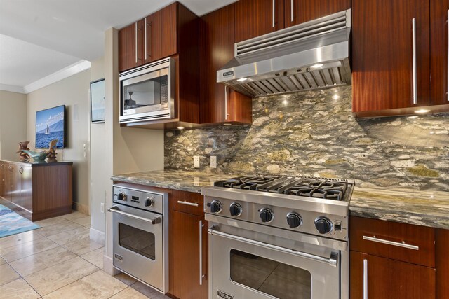 kitchen with backsplash, appliances with stainless steel finishes, ornamental molding, ventilation hood, and dark stone counters