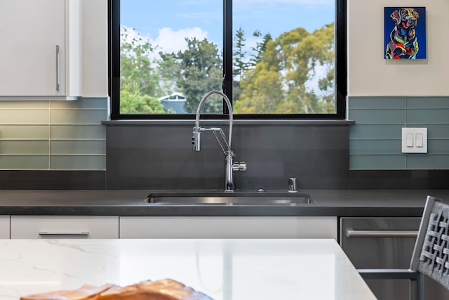 806 Kukia Pl, Kula, HI 96790 - kitchen with white cabinets and decorative backsplash