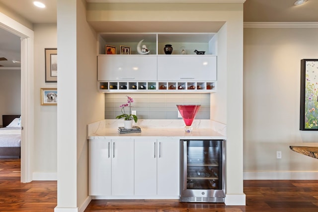 806 Kukia Pl, Kula, HI 96790 - indoor dry bar featuring wine cooler, ornamental molding, and wood finished floors