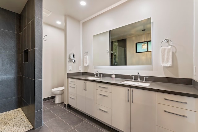 806 Kukia Pl, Kula, HI 96790 - bathroom featuring double vanity, a tile shower, tile patterned floors, and recessed lighting