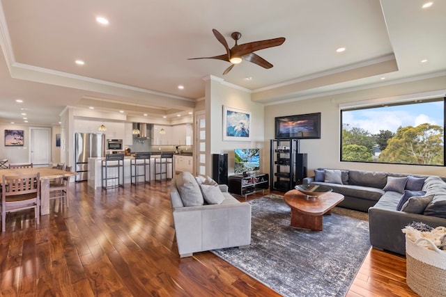 806 Kukia Pl, Kula, HI 96790 - living room with dark wood finished floors, ceiling fan, ornamental molding, recessed lighting, and a raised ceiling