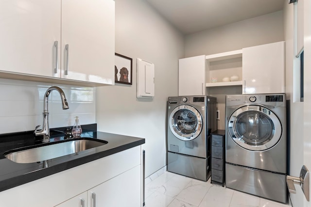 806 Kukia Pl, Kula, HI 96790 - laundry area with washer and dryer, light marble finish floors, and cabinet space