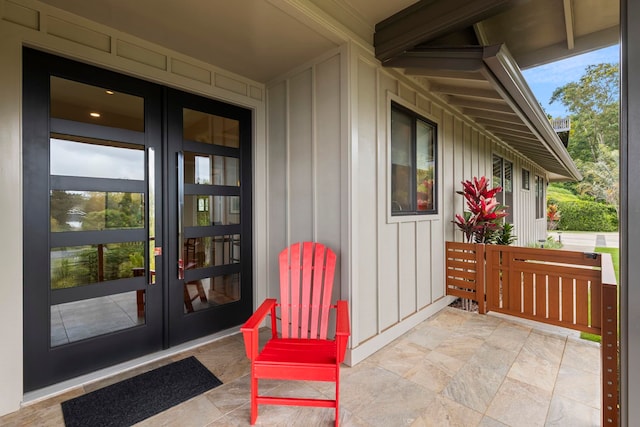 806 Kukia Pl, Kula, HI 96790 - entrance to property with french doors and board and batten siding