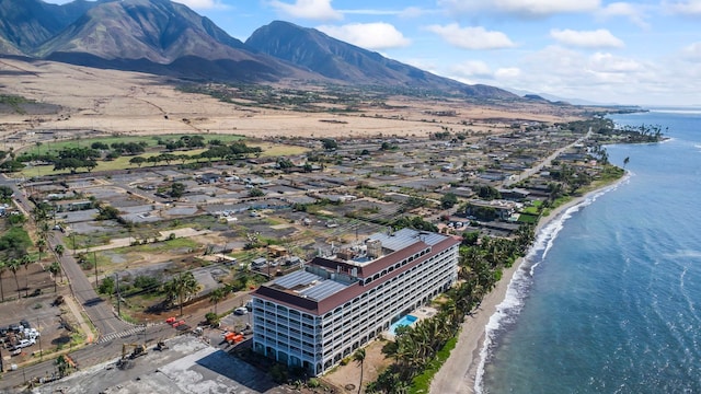 aerial view featuring a water and mountain view